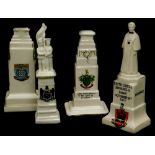 A Carlton china crested model of Edith Cavell's monument in Brussels, and three other First World Wa