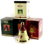 Four bottles of Bells Christmas commemorative whisky, for 1996, 1988, 1995 and 1992, three aged 8 ye