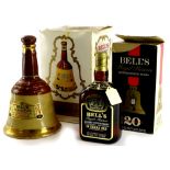 A bottle of Bells Royal Reserve 20 year celebration scotch, and a bottle of Bells specially selected