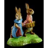 A John Beswick Beatrix Potter figure group, Flopsy and Benjamin Bunny, boxed.