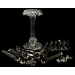 A cut glass table lustre, with petalated top and bottom and cut decoration of lozenges and roundels,