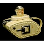 A Sadler type cream glazed tank shaped novelty teapot, the lid mounted with the head of Old Bill, pr