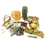 A large quantity of military containers, leather webbing etc.