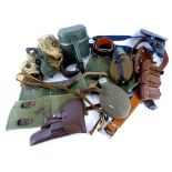 A quantity of Second World War replica German leather belts, holsters, water bottles, webbing, etc.