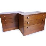 A pair of Stag teak chests of drawers, each with rounded corners above three graduated drawers, with