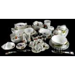 A large quantity of Royal Worcester Evesham serving dishes, egg cups, a chocolate sprinkler, etc.
