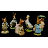 A collection of Beswick Beatrix Potter figures, Benjamin Bunny, Mr Drake Puddle duck, Mrs Flopsy Bun