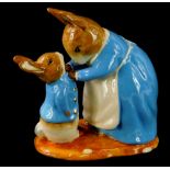 A Beswick ware limited edition figure group, Mrs Rabbit and Peter, number 2419 of 2500, boxed.