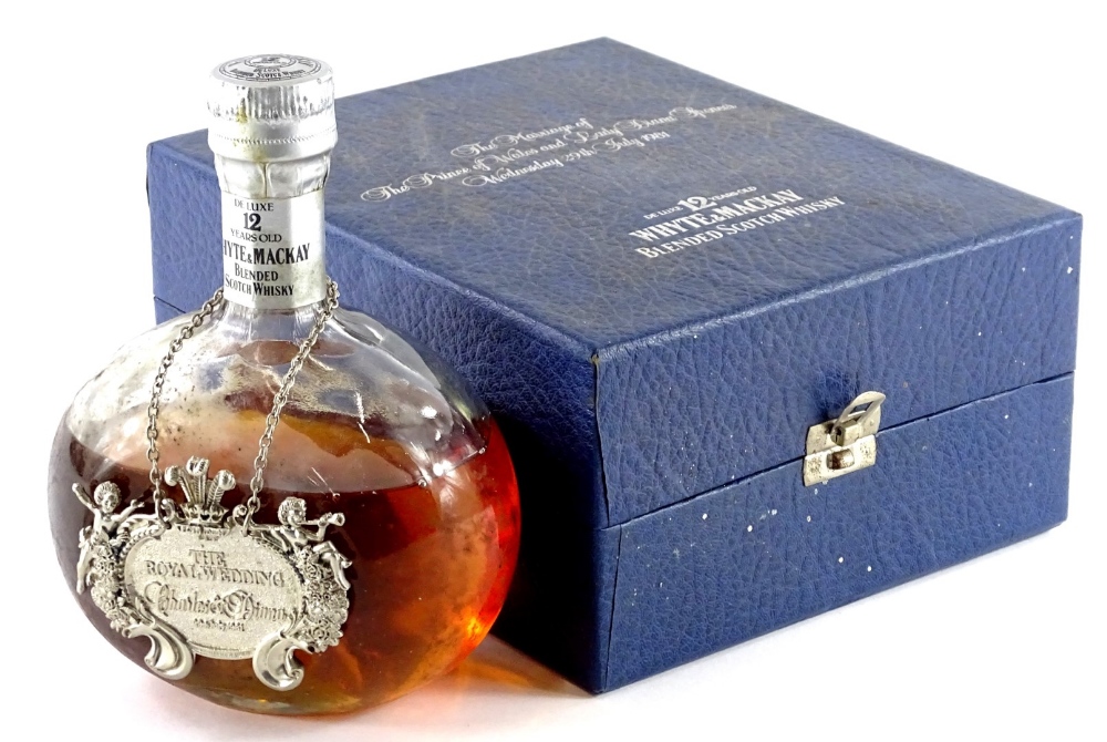 A bottle of Whyte and Mackay whisky, made to commemorate the marriage of the Prince of Wales and Lad