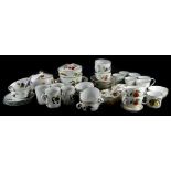 A quantity of Royal Worcester Evesham tea wares, etc., to include large cups, biscuit barrel, mugs,