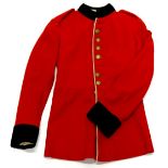 A vintage scarlet wool tunic, with regimental buttons, etc.