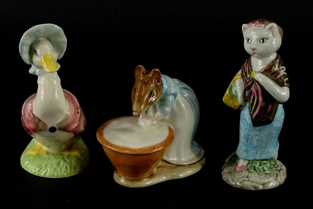 Three Beatrix Potter figures, Ann Marie, Susan and Jemima Puddleduck, two brown backstamp, one later