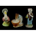 Three Beatrix Potter figures, Ann Marie, Susan and Jemima Puddleduck, two brown backstamp, one later