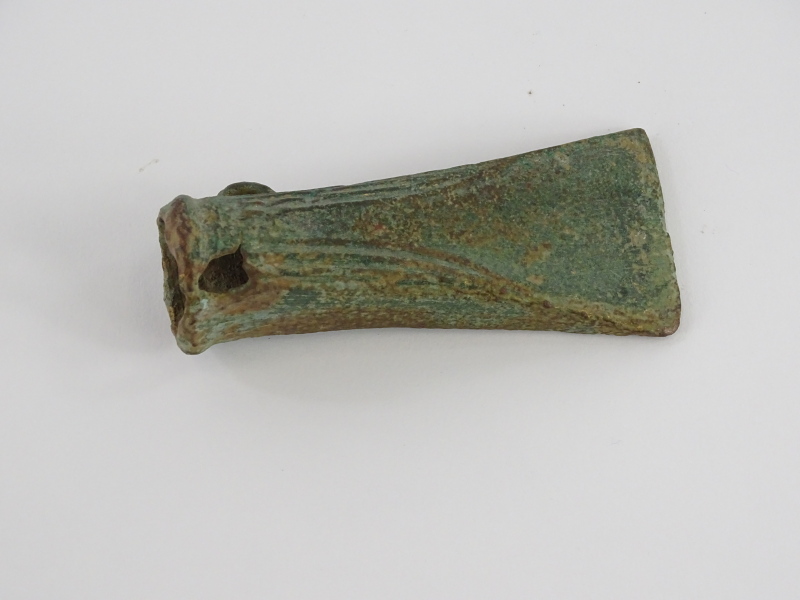 A Bronze Age bronze socket axe head, with reeded decoration to the sides, loop, etc. 10cm long. Pro - Image 2 of 2