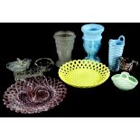 A collection of 19thC press moulded glass, to include pierced baskets, a basket weave tall two hand