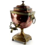 A 19thC copper and brass tea urn, of square tapering shape, with ring handles, 41cm high.