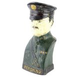 A cast iron money box, modelled in the form of General Pershing, 19.5cm high.