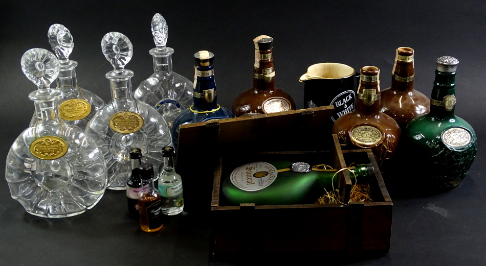 Various spirit related items, to include a set of four Remy Martin & Co decanters, an Armanac bottle