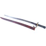 A mid to late 19thC French bayonet, the blackened metal scabbard painted red, the blade indistinctly