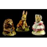 Three Beswick figures, Sunny Bunny Sat on a Bank, The Old Woman who Lived in a Shoe, and Old Mr Pric