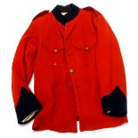 A Boer War period British scarlet cavalry patrol tunic, in red with navy collar, etc.
