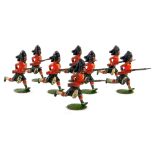 A set of eight Britains Black Watch charging lead soldiers, set eleven, 1904-1911, oval base edition