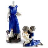 A Bing & Grondahl porcelain figure group, modelled in the form of a lady feeding chickens, printed m