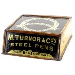 A Victorian shop display for M Turnor & Co steel pens, with walnut case and gilt and black verre egl