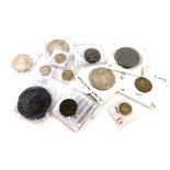 A quantity of mainly British silver and bronze coins, to include a George II 1754 farthing, two Vict
