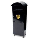 A black painted metal portable letter box, the hinged lid decorated with a gilt crest on tubular fee