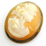 A cameo brooch, with oval design cameo of a maiden, in a gold plated frame, 3.5cm x 3cm.
