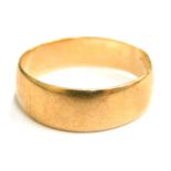 A 9ct gold wedding band, ring size T½, 3.2g.