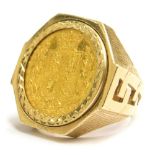 A Victoria young head full gold sovereign ring, dated 1863, in a signet ring mount, marked 9ct, 18g