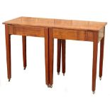 A late 18th-early 19thC mahogany oval drop-leaf table, on channelled supports with double gateleg a