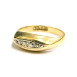 An 18ct gold and platinum diamond set ring, with channel set tiny diamonds, ring size O, 3g all in.