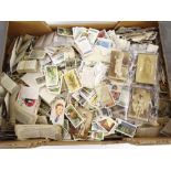 A large quantity of cigarette cards trade cards and tea cards, to include players, some late 19th/ea