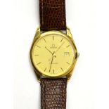 An Omega Seamaster gentleman's wristwatch, in a gold plated case, with leather strap.