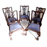 A set of five early 20thC mahogany dining chairs in George III style, each with a pierced splat, a d