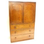 A 19thC plum pudding mahogany linen press, with a moulded part cornice, above two panelled doors enc