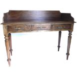 A 19thC mahogany washstand, with a raised back, the rectangular top with a moulded edge above three