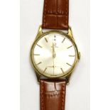 An Omega 9ct gold gentleman's wristwatch, with plain batons and leather strap.