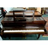 John Broadwood and Sons, London. A rosewood cottage grand piano, on square tapering legs, no visible