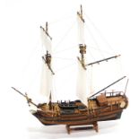 A wooden model of a warship The Galleon Halifax, with realistic decking and masts, set with cannon o