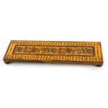 A late 19thC Tunbridge ware cribbage board of rectangular form, on a central floral decoration, an o