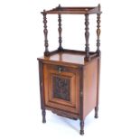 A Victorian walnut coal purdonium, the raised top with a gallery on turned supports, the base with a