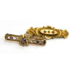 Two bar brooches, comprising a 9ct gold garnet and diamond set bar brooch, 4cm wide, and a 9ct gold