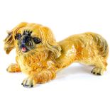 A Goebel ceramic large model of a Pekingese dog, printed marks in blue to underside, 31cm long.