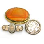 Three Victorian style brooches, comprising a silver bi colour brooch, depicting a bird in gold highl