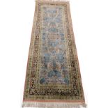 Withdrawn presale by vendor. A Persian silk type runner, decorated with flowers, leaves, etc., on a
