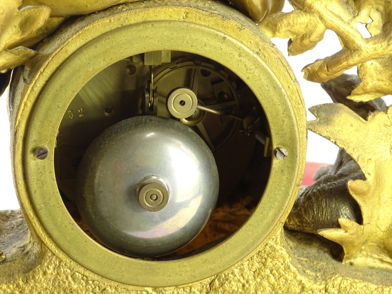 A late 19thC gilt metal mantel clock, the 8cm diameter Roman numeric dial surmounted by a figure of - Image 3 of 3